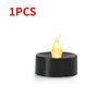 A single black LED candle with a warm white glow is shown on a stand.