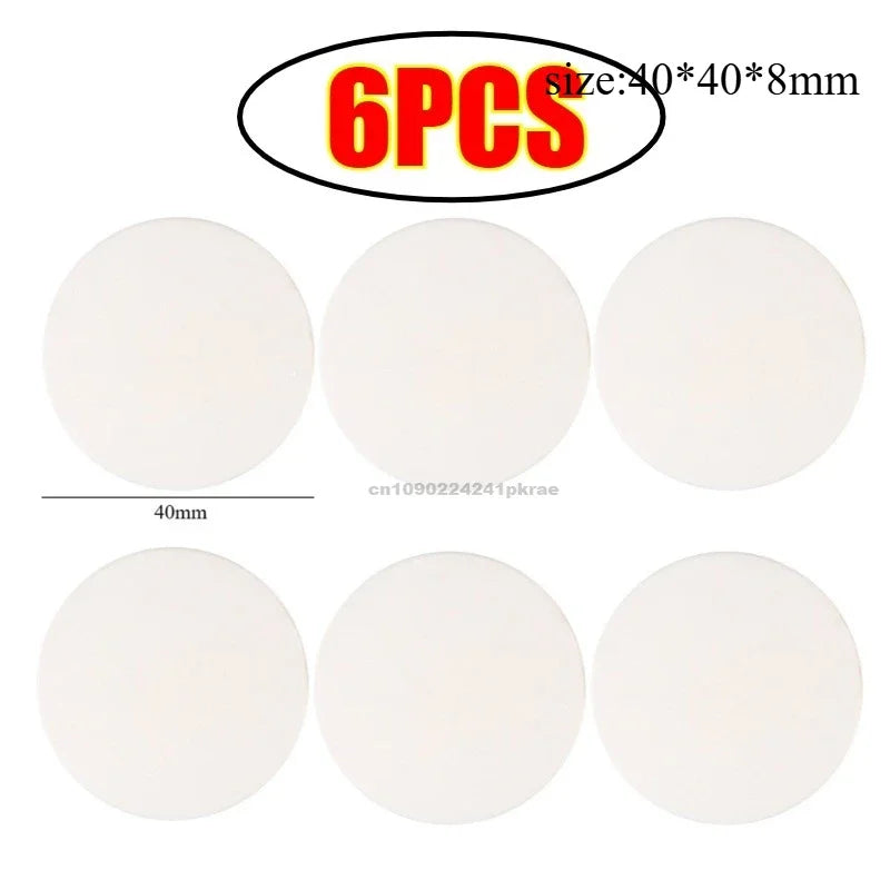 Six white silicone door stoppers or bumpers with a size of 40x40x8mm.