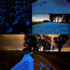 A series of images showing glow-in-the-dark luminous pebbles used for garden and path decoration at night.