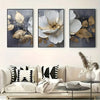 A set of three modern abstract floral wall art prints featuring white and gold flowers on a dark background.