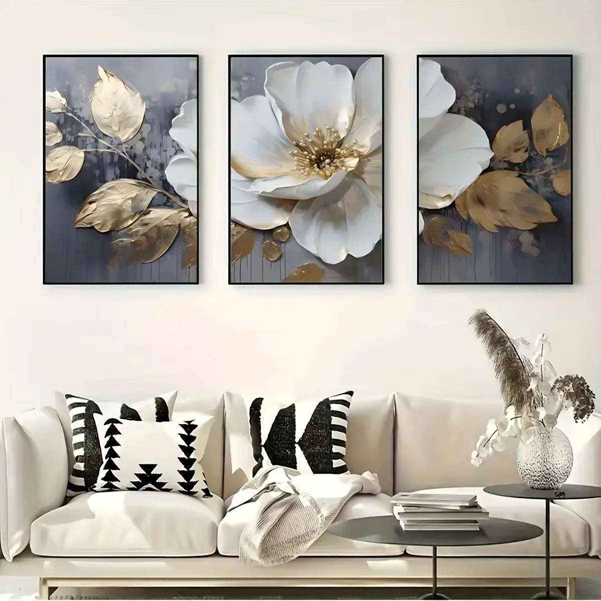 A set of three modern abstract floral wall art prints featuring white and gold flowers on a dark background.