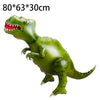 A green dinosaur figure is shown, likely a birthday party decoration.