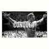 Black and white photo of Arnold Schwarzenegger flexing during a competition, with the word CONQUER overlaid.