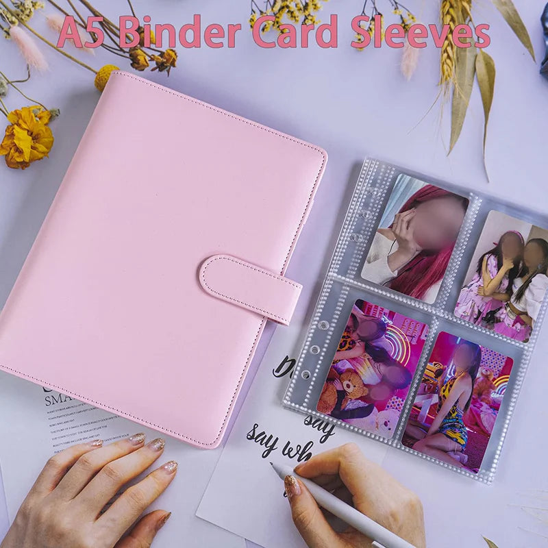 A pink reusable A5 binder with a clear plastic sleeve containing several Kpop photocards and stationery.