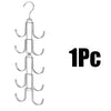 A silver 5-tier rotating organizer hanger with swivel hooks.