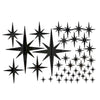 A collection of black acrylic star mirror wall stickers arranged in a pattern.