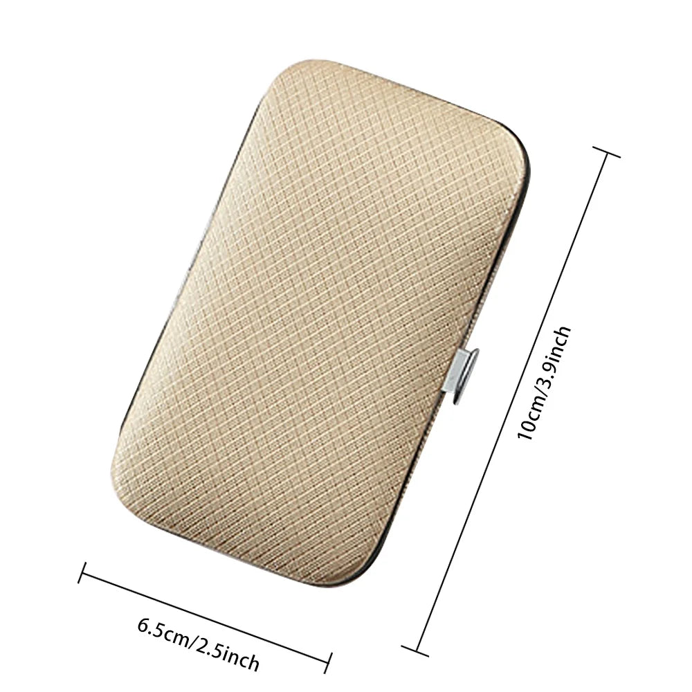 A beige manicure and pedicure kit in a leather case with dimensions 10cm by 6.5cm.