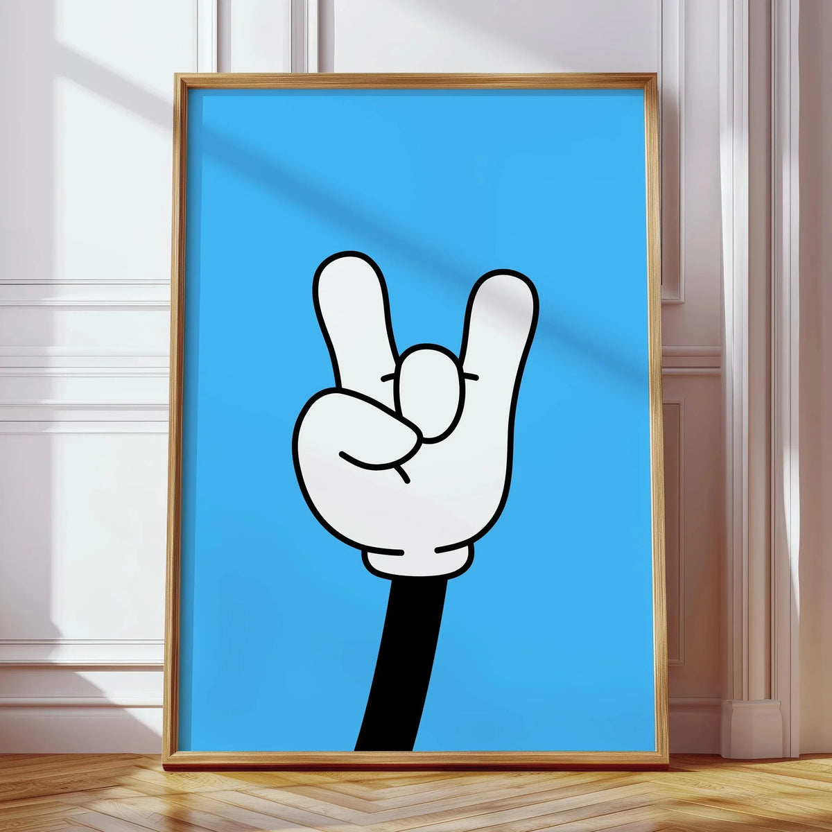 Arte de lienzo enmarcado con una mano pintada haciendo el signo rock'n roll contra un fondo azul brillante