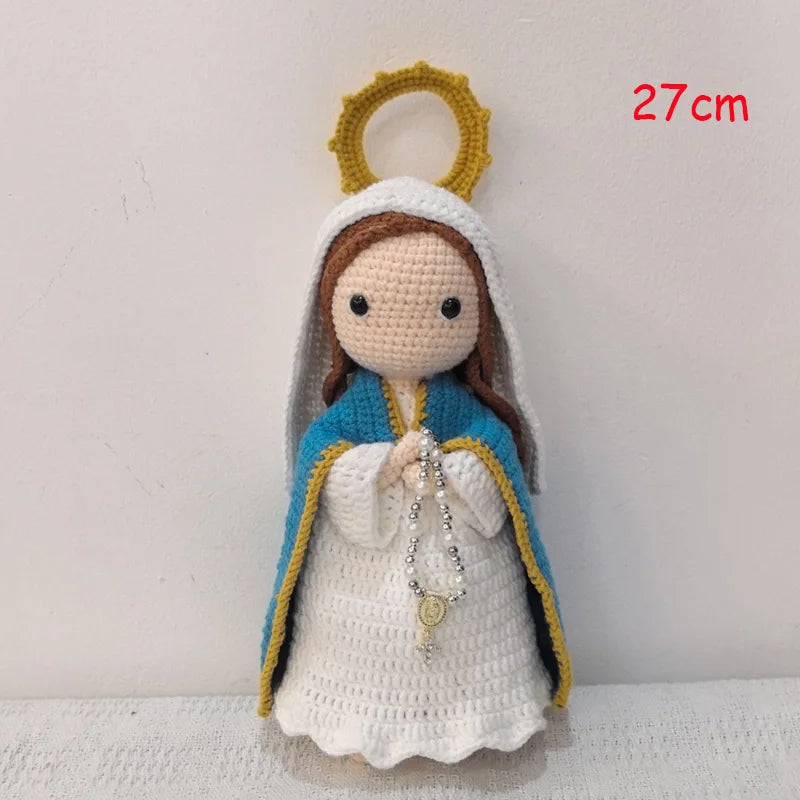 Handcrafted Virgin Mary crochet doll with a golden halo and blue and white robes