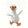 A white duck plush toy with orange feet and a beak, used as a keychain pendant.