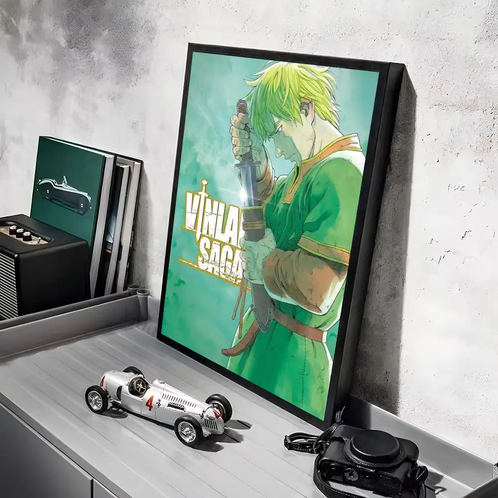 A poster featuring a character from Vinland Saga anime in green and yellow tones displayed on a shelf.