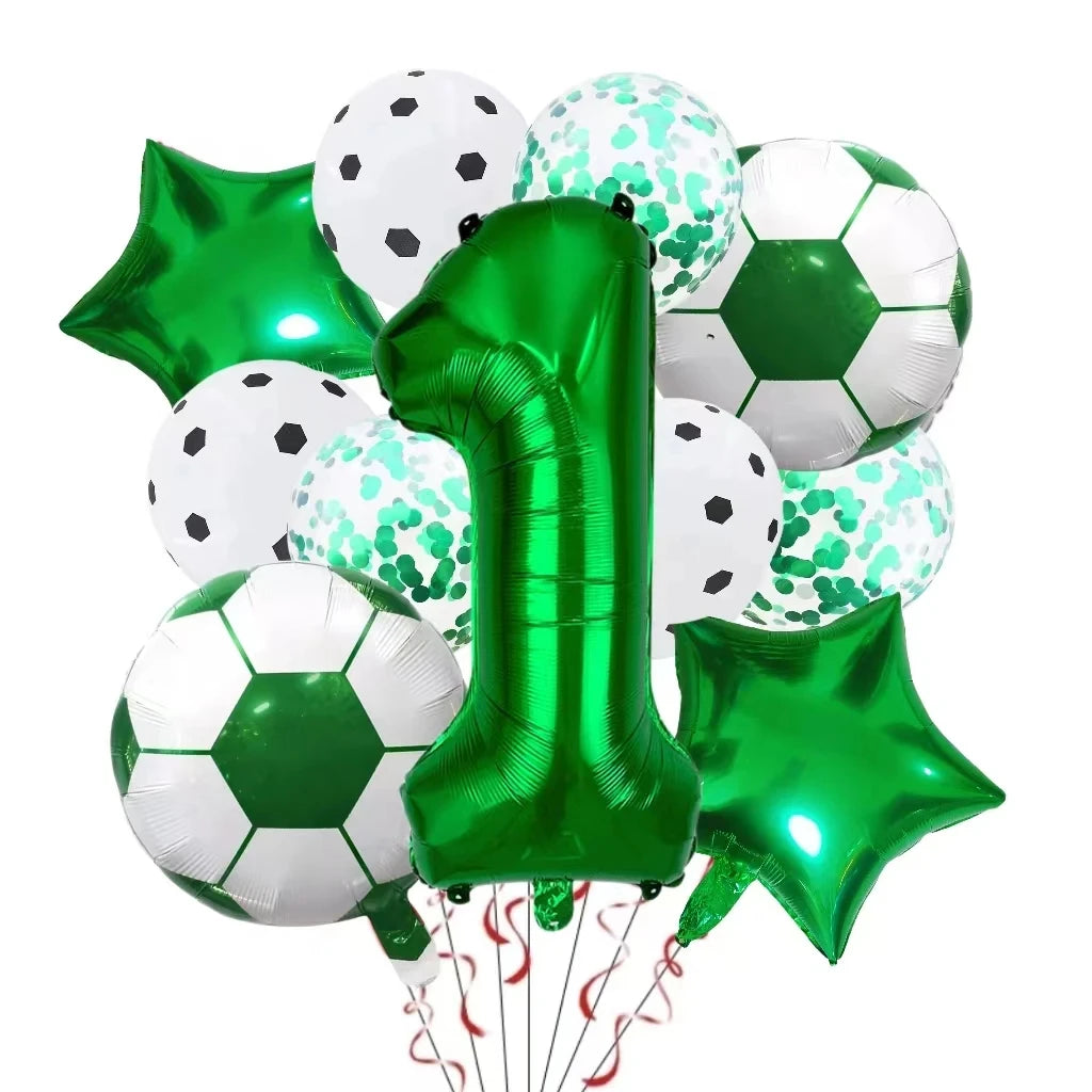 A collection of green and white foil balloons, including a number one balloon and soccer ball shaped balloons.