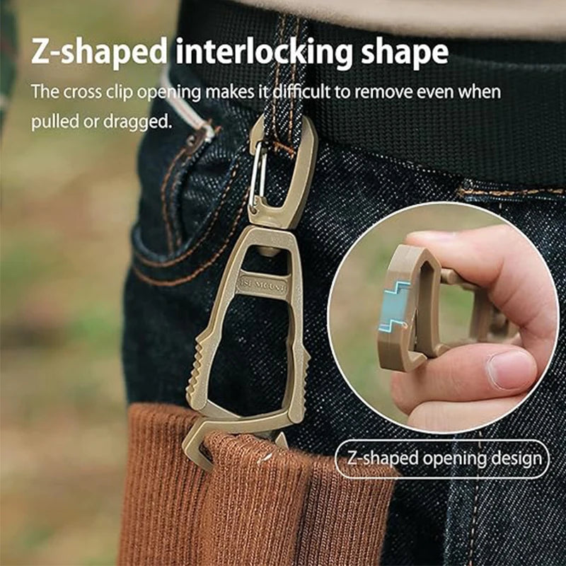 Close-up of a Z-shaped interlocking clip opening on a dark fabric, demonstrating the difficulty in removing it when pulled or