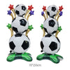 A standing foil trophy balloon featuring soccer balls and gold accents with red and blue star decorations.