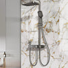 A modern shower fixture with a handheld showerhead and flexible hose mounted on a marble-patterned wall.