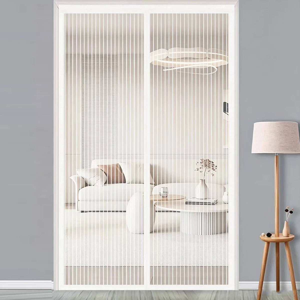 A white magnetic automatic screen door curtain is shown in a modern interior setting.