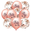 A pack of rose gold latex confetti balloons with 'Bride to Be' text and a silhouette of a horse and carriage.