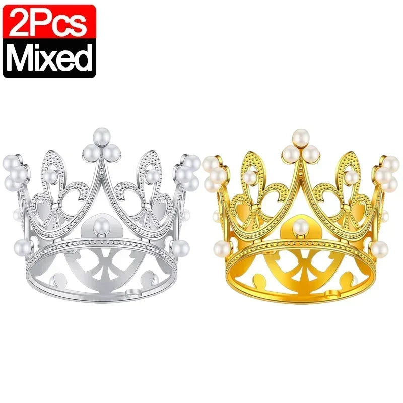 A set of two mixed mini crown cake toppers, one silver and one gold.