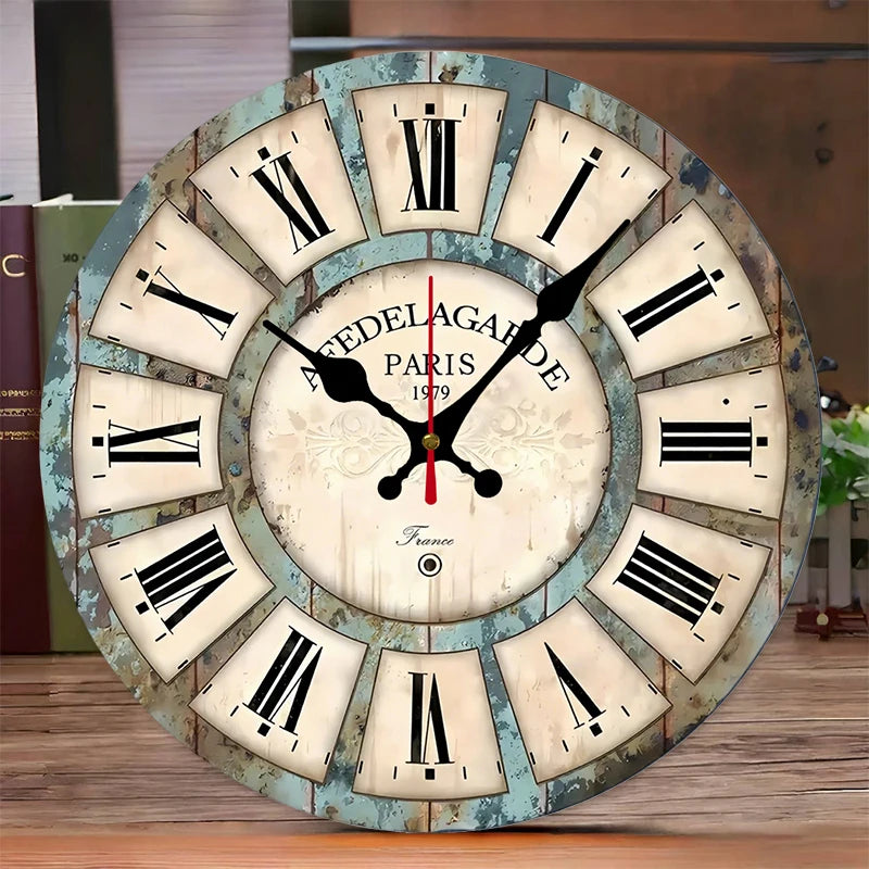 A round wooden wall clock with Roman numerals showing the time, featuring the text Paris 1979.