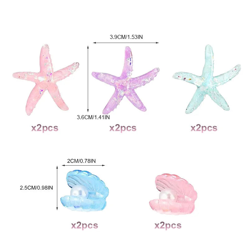 A set of mermaid tail cake toppers featuring sea stars and seashells in pink and light blue colors.