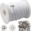 A spool of white braided cotton candle wicks and several loose metal wick holders.