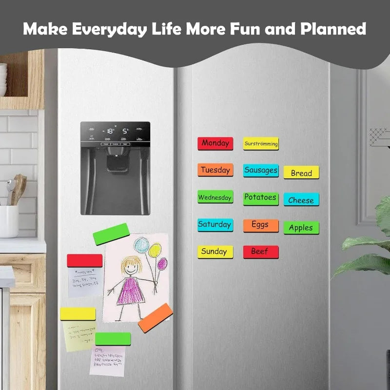 A refrigerator door is decorated with magnetic dry erase labels for a weekly meal plan, showing days of the week and correspo