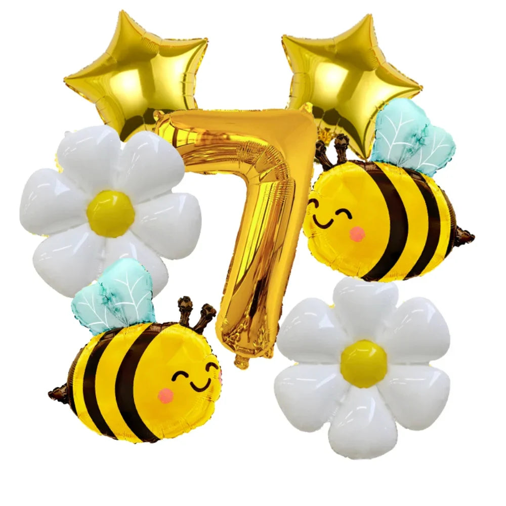 A set of six yellow and white aluminum foil daisy balloons, including a number seven and a bee shape.