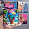 A collection of magnets featuring a vibrant Miami cityscape, including a neon sign and tropical elements.