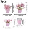 Three small pink faux bonsai plants in rectangular pots for home decor