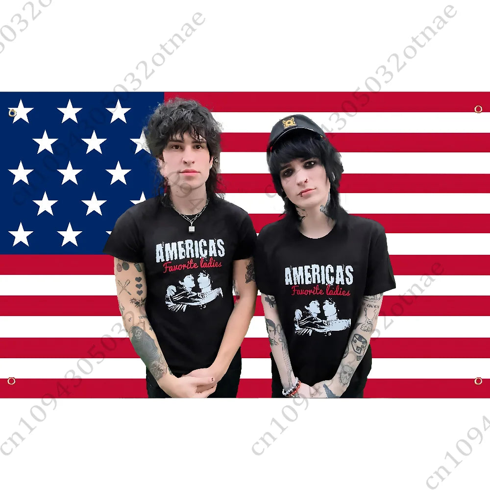 Two individuals wearing black t-shirts with American women graphic designs against a red and white striped background.