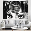 A black and white manga-style tapestry featuring a close-up of an intense eye and hair design.