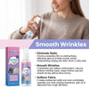 A woman sprays an anti-static fabric spray onto her sweater to smooth wrinkles and eliminate static.