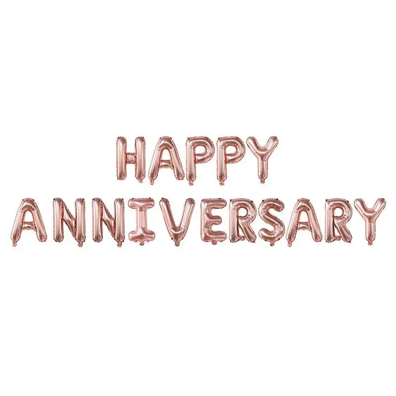 A set of metallic rose gold foil balloons spelling out HAPPY ANNIVERSARY