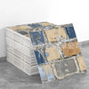 A stack of marble peel-and-stick tiles featuring blue and gold accents on a gray background.
