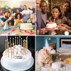 A white birthday cake decorated with gold accents and surrounded by metallic candles and holders.