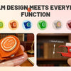 Colorful magnetic clips in various colors are shown being used to attach items on a hand and a wooden surface.