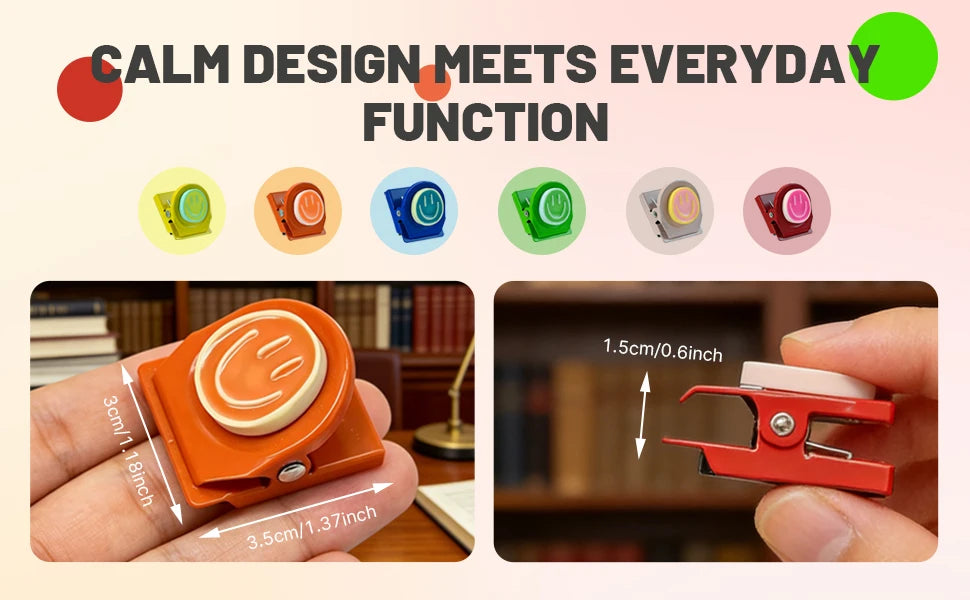 Colorful magnetic clips in various colors are shown being used to attach items on a hand and a wooden surface.
