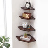 A set of two natural wood wall-mounted corner shelves displaying a vintage alarm clock, a retro radio, and a decorative owl f