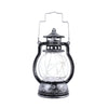 A vintage-style LED lantern night light with a glass bulb and metal base, featuring a warm retro glow.