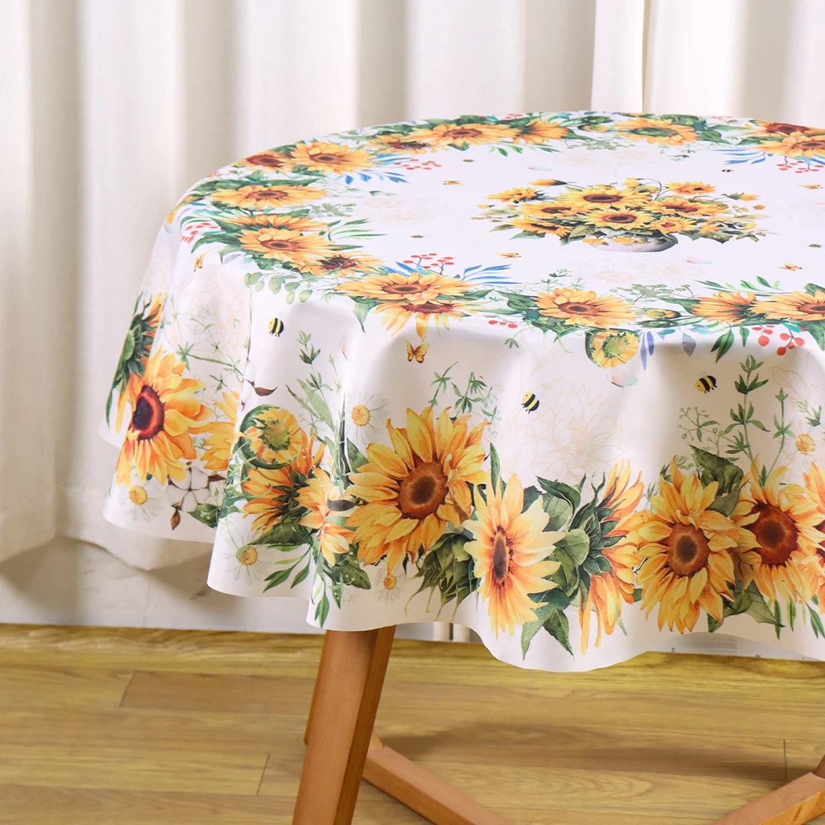 Sunflower printed tablecloth featuring yellow and orange flowers for rustic dining.