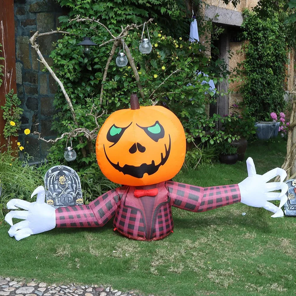 An inflatable orange pumpkin decoration with a carved face and a plaid shirt costume.