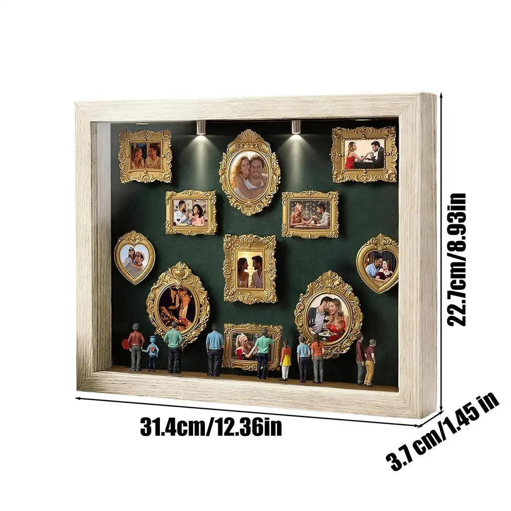 A wooden display case featuring framed photos and figurines illuminated by LED lights.