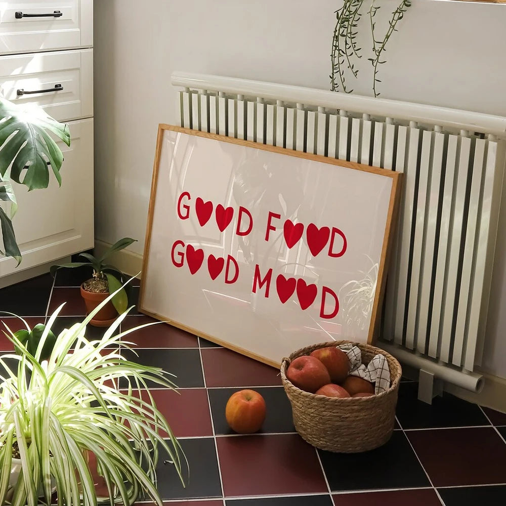 Minimalist chef heart canvas wall art featuring red hearts on a wooden frame displayed in a kitchen setting.