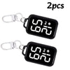 Two black LED keychain pocket watches with digital displays and silver clasps