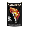 A black flag featuring the text Halloween and a depiction of a knife with dripping blood, promoting The Night He Came Home.