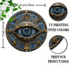 A circular metal wall art decoration depicting an ancient Egyptian all-seeing eye with intricate gold detailing and blue iris