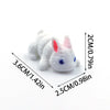 A white and pink 3D printed cartoon rabbit figurine shown with dimension lines.