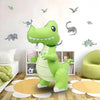 A large, bright green dinosaur plush toy standing on a wooden floor with white and orange circular mats.