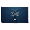 A dark blue banner featuring a silver stylized tree with stars on a textured fabric background.
