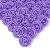 A close-up view of purple artificial foam rose decorations arranged in a heart shape.